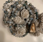 Crystal mala necklace detail with silver roses